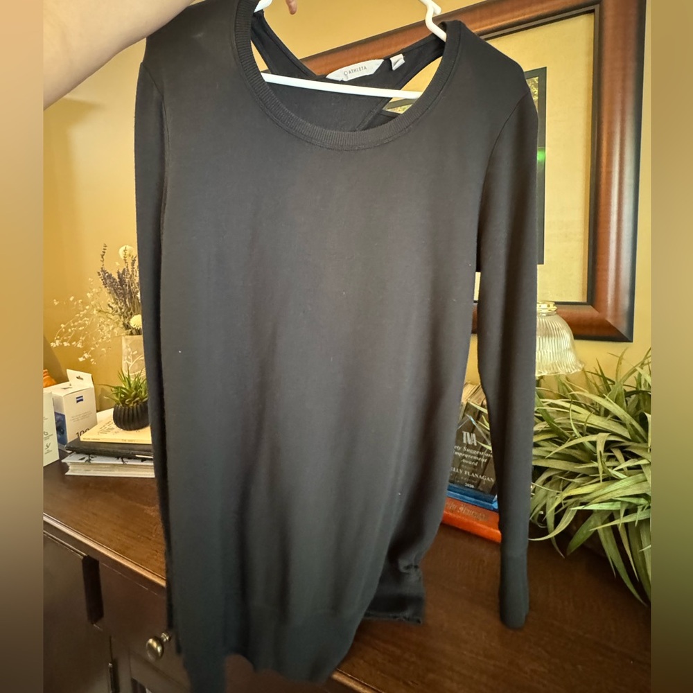 Athleta long sleeve top with opening in back, never used